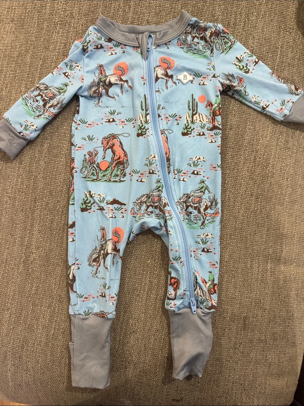 BURLEBO Light Blue Cowboy Print Zip Footed One-Piece